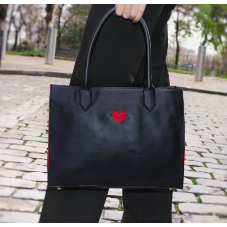 Black PARIS soft leather tote bag with red embroidered mouth and borders, lifestyle view 4 |Gloria Balensi