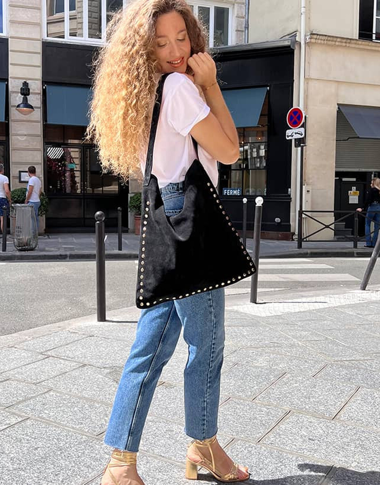 Black leather tote bag LOVELY, red handles, and silver studs |Gloria Balensi