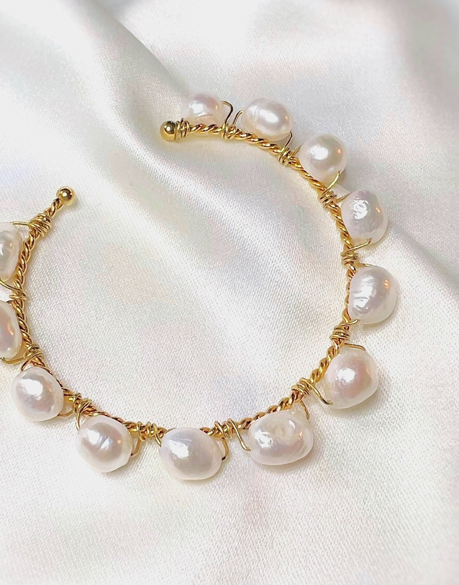 TYA gold-plated twisted link bracelet in stainless steel and |Gloria Balensi