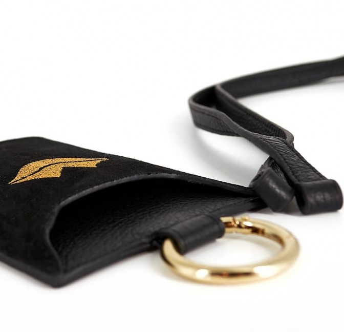 Black and gold velvet leather TELI phone pouch, lying view | Gloria Balensi