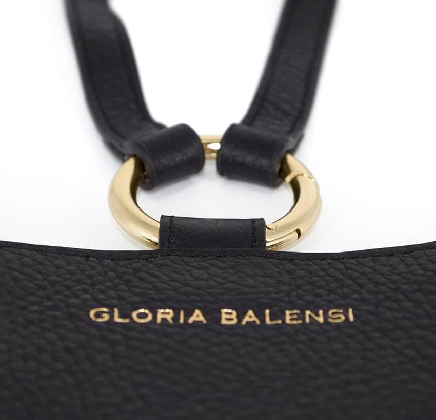 Black and gold velvet leather TELI phone pouch, zoom view gold marking| Gloria Balensi